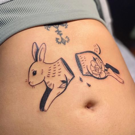 29 Lovely Rabbit Tattoo Ideas for Men and Women in 2023 Rabbits Tattoo, Rabbit Tattoo Ideas, Rabbit Tattoo, Bunny Tattoos, Wonderland Tattoo, Rabbit Tattoos, Upper Arm Tattoos, Tattoo Ideas For Men, Stomach Tattoos