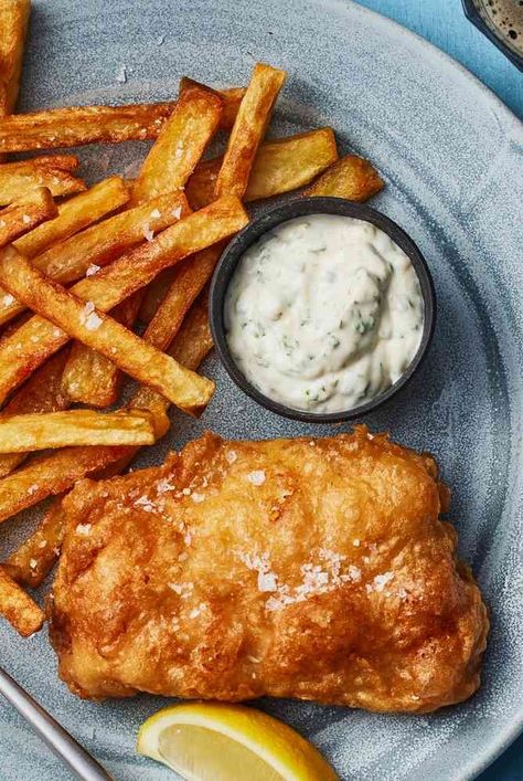 Make classic British fish and chips at home with this recipe, which includes fried cod, tartare sauce, triple-fried french chips, and mushy peas. Homemade Fish And Chips, Triple Cooked Chips, British Fish And Chips, Pub Night, Fish Batter Recipe, Fish N Chips Recipe, Fried Cod, Fried Fish Recipes, Night At Home