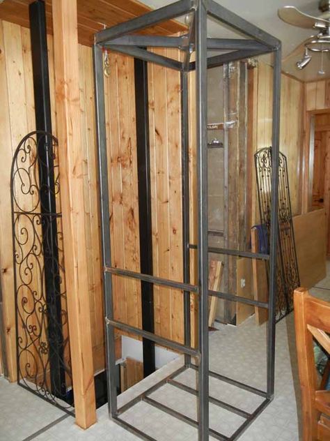 This is how we built our vintage look bird cage elevator. (short version) First we bought a 110 volt electric hoist and secured it to a base in the attic. Attached about 15 feet of 1/4 inch stainless steel cable. One of my husband's clients is a steel fabricator so they work traded... Diy Home Elevator, Diy Elevator How To Build, Homemade Elevator, Home Lift Elevator Design, Home Elevator Interior, Attic Elevator, Diy Elevator, Residential Elevators, Attic Lift