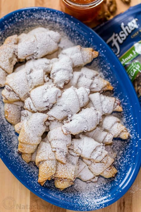 My Mother is famous for her Rugelach Recipe! These walnut-cranberry-apricot rugelach cookies are soft, crumbly, flaky, loaded! They always disappear fast! | natashaskitchen.com Russian Cookies, Rugelach Cookies, Natasha Kitchen, Rugelach Recipe, Hanukkah Cookies, Natashas Kitchen, Nut Rolls, Ukrainian Food, Bite Size Cookies