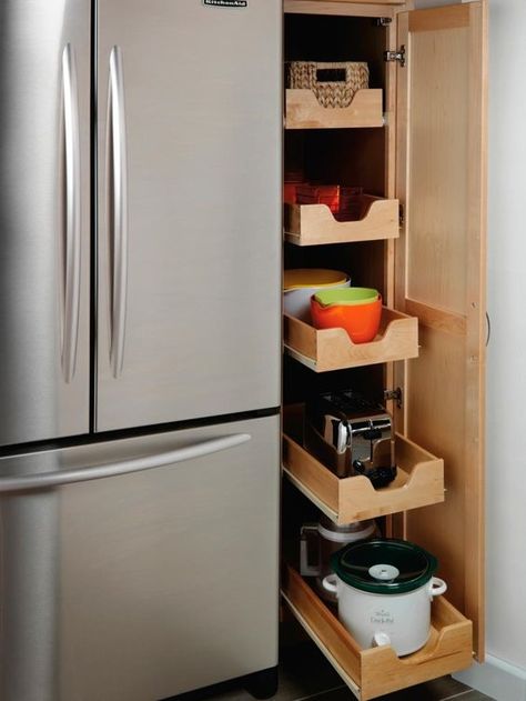 Efficient kitchen vertical storage idea with pull out drawers. #kitchen #storage #organization #cupboards #cabinets #shelves #decoratingideas #decorhomeideas #drawers Pull Out Appliance Cabinet, Pull Out Drawers Kitchen, 2025 Kitchen, Narrow Pantry, Roll Out Shelves, Drawers Kitchen, Appliance Cabinet, Pantry Drawers, Efficient Kitchen