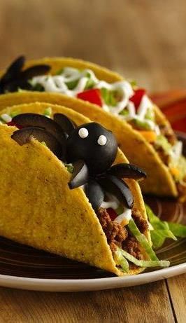 Who says Halloween food has to be sweet? These tasty tacos are hiding a spooky surprise: a giant spider made from olives and sour cream. Simply arrange them to peek out of the shells. It’s a trick and a treat! Simple Tacos, Halloween Eats, Holiday Recipies, Tacos Dorados, Halloween Foods, Halloween Party Food, Halloween Appetizers, Easy Taco, Halloween Dinner