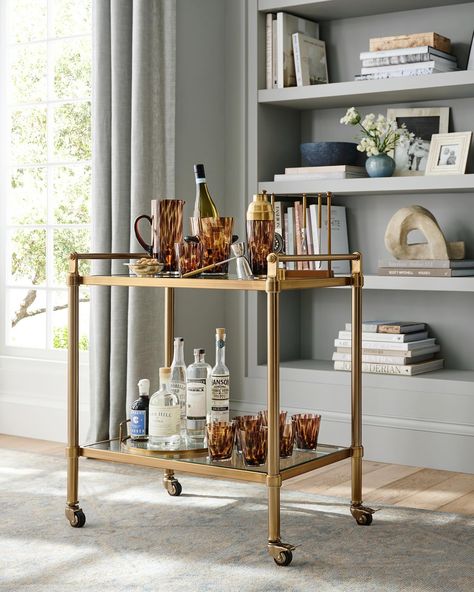 An elevated classic, our Everson Collection comes in an Antique Brass finish. The clean lines and clear surfaces keep your space looking open and light. Swipe to view the full collection.