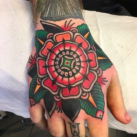 Tattoo uploaded by rcallejatattoo • Mandala flower on hand. Clean and vibrant work by Filip Henningsson. #FilipHenningsson #RedDragonTattoo #traditionaltattoo #boldtattoos #mandala #flower • 265461 • Tattoodo Mandala Arm Tattoo, Traditional Hand Tattoo, Mangas Tattoo, Red Dragon Tattoo, Mandala Hand Tattoos, Circle Tattoos, Tattoo Magazine, Traditional Tattoo Sleeve, Hand Tats