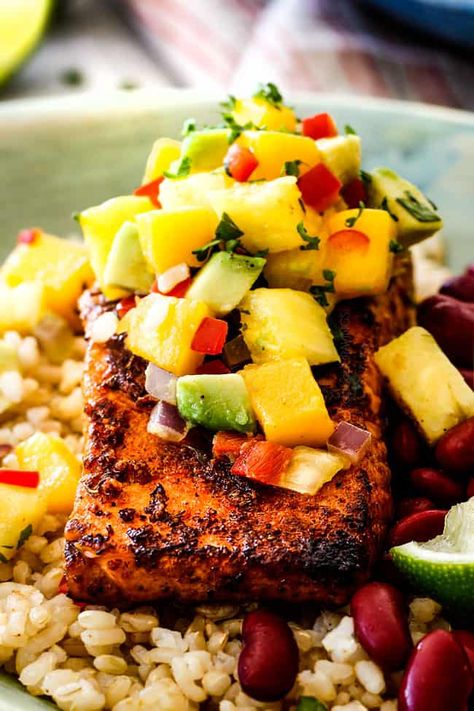 Salmon With Mango, Mango Salsa Salmon, Cajun Salmon, Avocado Salsa Recipe, Garlic Butter Salmon, Mango Avocado Salsa, Mango Avocado, Carlsbad Cravings, Baked Salmon Recipes