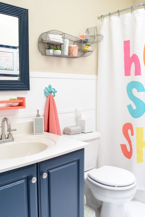 Kid's Bathroom Decor: How To Freshen Up With A Modern Nautical Theme + Free Printable Artwork - Staging A Kid's Bathroom To Sell In Just 8 Hours   I’m showing you how to stage a kid’s bathroom to sell and revealing my daughter’s new colorful, and  nautical bathroom theme.   I’m also giving you a free printable download that’s certain to melt your kid’s heart and look amazing in any bathroom for young kids (or even kids at heart)!  #kidsbathroom #nauticalbathroom #bathroomstorageideas Disney Bathroom Ideas Kids, Kids Ocean Bathroom, Baby Bathroom Decor, Small Kids Bathroom Ideas, Colorful Kids Bathroom, Kid Bathrooms, Nautical Theme Bathroom, Gender Neutral Kids Bathroom, Kids Bathroom Themes