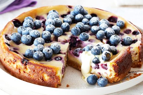 Spoil your friends and family with a sensational blueberry and lemon baked cheesecake. Festive Dessert Recipes, Blueberry Cheesecake Recipe, Lemon Blueberry Cheesecake, Lemon Cheesecake Recipes, Baked Cheesecake, White Chocolate Cheesecake, Baked Cheesecake Recipe, Festive Desserts, Blueberry Cheesecake