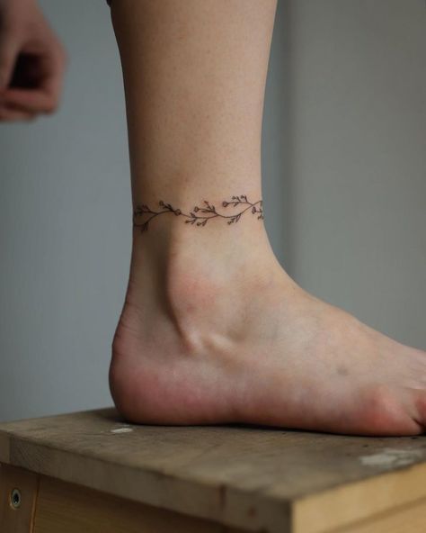 Flower Anklet Tattoos, Ankle Tattoos For Women Wrap Around, Around Ankle Tattoo, Wrap Around Ankle Tattoos, Anklet Tattoos For Women, Miniature Tattoos, Ankle Band Tattoo, Anklet Tattoo, Wrap Around Wrist Tattoos