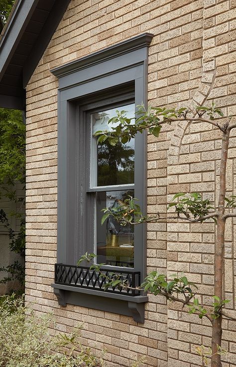 Window Trim Exterior Brick, Shutter Replacement Ideas, Outside Windows Ideas, Brick House With Grey Trim, Exterior Window Accent Ideas, Limestone Window Surround, Gray Windows Exterior, Framed Exterior Windows, Exterior Trim Around Windows