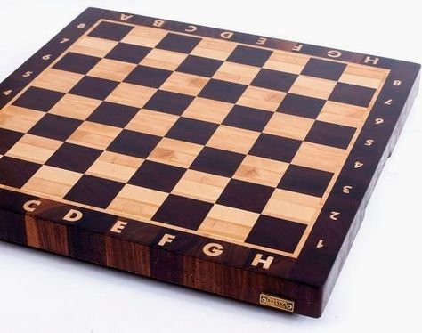 A foldable chess board has the advantage that it can contain the pieces inside! - This board is from mtmwood.com Chess Board, Chess, Canning