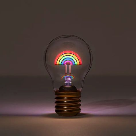 17 Things That Glow To Add a Little Light and Kitsch to Your Home Wireless Light Bulb, Magic Rainbow, Decorative Night Lights, Uncommon Goods, Heart Lights, Rainbow Light, Point And Shoot Camera, Lighting Lamps, Unique Birthday Gifts