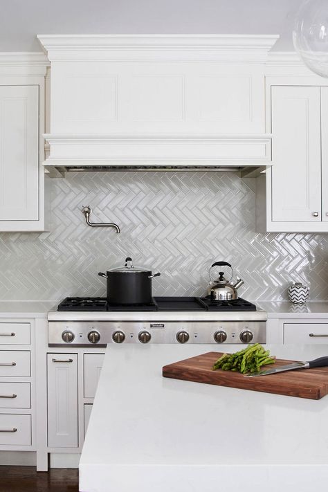 Transitional Kitchen With White Cabinets And Sleek Gray Ceramic Herringbone Backsplash Tiles Blue Herringbone Backsplash, Herringbone Tiles Kitchen, Herringbone Backsplash Kitchen, White Herringbone Backsplash, Marble Interior Design, Herringbone Tile Backsplash, Brick Backsplash Kitchen, Patterned Tile Backsplash, Marble Interior