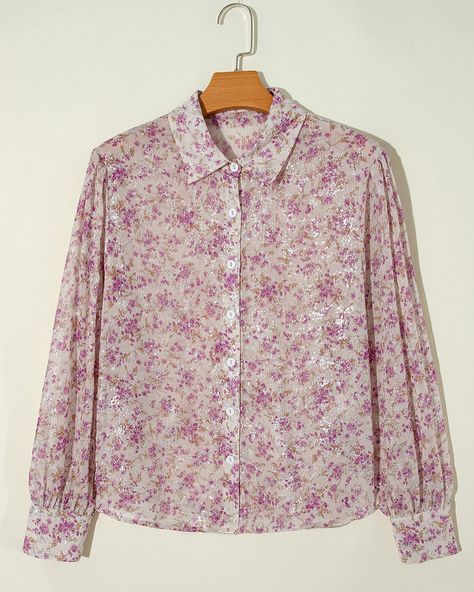 Printed Collared Neck Long Sleeve Shirt This floral button-up blouse features a soft beige background with pink and purple blossoms, accented with a subtle shimmer. It has a relaxed fit with long, puffed sleeves and a classic collar, offering a perfect blend of comfort and style. Link: https://sybariticboutique.com/products/printed-collared-neck-long-sleeve-shirt-2 #sybariticboutique #boutiquestyle #womenfashion #fashionnova #clothingboutique #clothingstores #elegantfashion #fashionlover ... Sleeve Shirt Outfit, Chic Shirts, Scarf Poncho, Bishop Sleeve, Style And Grace, Effortless Chic, Plus Size Swimwear, Basic Style, Floral Top