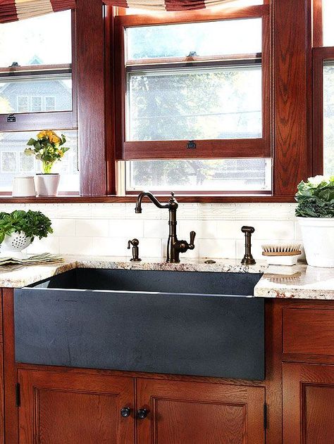 A composite granite sink is an engineered product manufactured using a mix of granite stone dust and acrylic resins molded into sink form. Kitchen Sink Decor Ideas, Rustic Kitchen Sinks, Apron Sinks, Kitchen Sink Remodel, Black Granite Sink, Kitchen Sink Decor, Apron Sink Kitchen, Kitchen Sink Design, Apron Sink