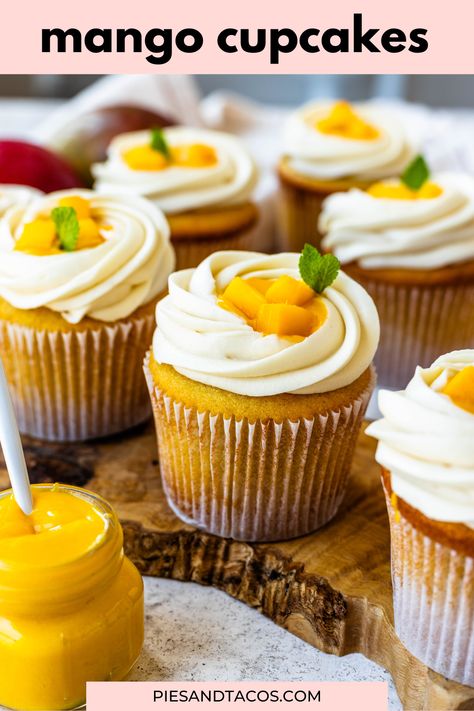 These Mango Cupcakes are soft and delicious, filled with sweet Mango Curd, topped with tangy Cream Cheese Frosting, and fresh mango pieces. Pies And Tacos, Mango Cupcakes, Strawberry Cheesecake Cupcakes, Mango Curd, Tropical Cupcakes, Baklava Cheesecake, Cupcakes Filled, Cupcakes With Cream Cheese Frosting, Coconut Cupcakes