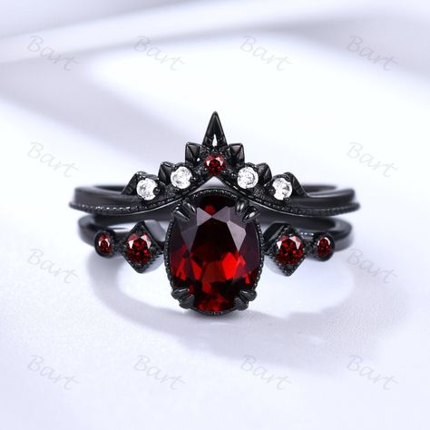 Rhodium Black Gold Oval Garnet Ring, Punky Style Black Ring,Five Stone Garnet Engagement Ring, Black and Red Promise Ring January Birthstone ★ Product Specifications 1. Oval Garnet & Four garnet Side Stone Engagement Ring: Metal Type: 14K Black Gold Center Stone: 6*8mm Oval Natural Garnet Side Stone: Round cut Natural Garnet 8-Prongs pave set Same style ring set: https://www.etsy.com/listing/1614839322/black-gold-alexandrite-ring-set-color With Alexandrite: https://www.etsy.com/listing/162902687 Black And Red Wedding Rings Women, Black Ring With Red Stone, Black And Red Rings Engagement, Halloween Engagement Ring, Persephone Engagement Ring, Black And Red Ring, Black And Red Engagement Ring, Red And Black Engagement Rings, Goth Wedding Ring Victorian Gothic