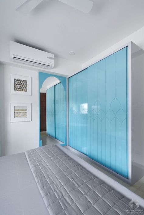 A Juxtaposed Abode Of Subtle Elegance | Design Studio - The Architects Diary Blue Wardrobe, Light Blue Bedroom, Glass Wardrobe, Apartment Designs, A Modern House, The Architects Diary, Walk In Closet Design, Modern Cupboard Design, Wardrobe Door Designs