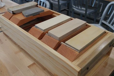 ired by the Odate sharpening stone tub, this box was designed to elevate sharpening stones on their holders and provide storage when not in use. Pine throughout with walnut handles. Stone holders are Fir. Sharpening Station, Simple Workbench Plans, Stone Tub, Bill Of Materials, Whittling Projects, Japanese Tools, Japanese Woodworking, Woodworking Box, Workbench Plans