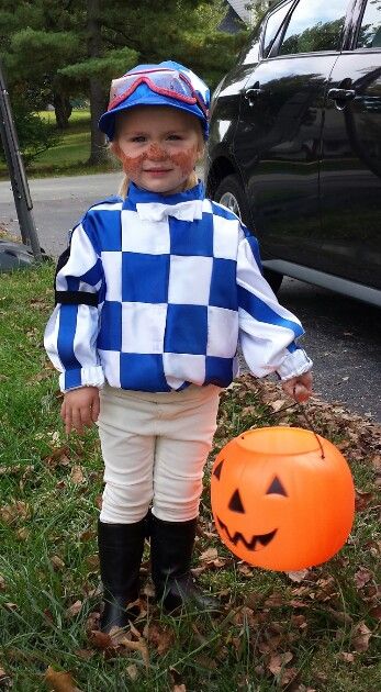 Toddler jockey costume.  This was such a hit and my daughter is so proud of her Secretariat silks. Kentucky Derby Birthday Party, Jockey Outfit, Jockey Costume, Kentucky Derby Birthday, Equestrian Party, Chic Halloween Decor, Team Costumes, Happy Horse, Horse Costumes