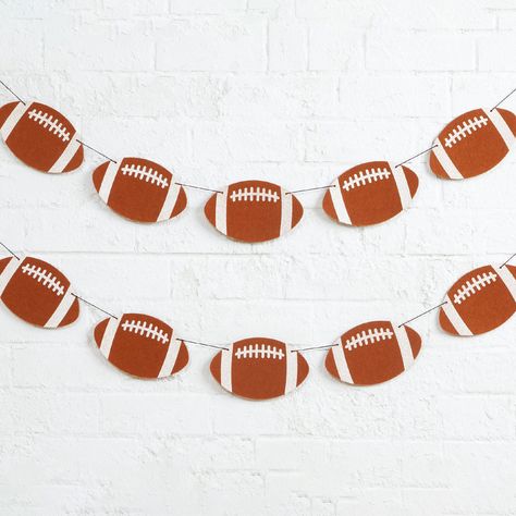 Buy the Assorted 8ft. Felt Football Banner by Celebrate It™, 1pc. at Michaels. Host football watch parties or celebrate your little one's big win by decorating the house with this felt football banner. You can even decorate your truck bed for a college tailgate. This item is assorted. Style will vary and is selected at random. Host football watch parties or celebrate your little one's big win by decorating the house with this felt football banner. You can even decorate your truck bed for a colle Diy Football Decorations, Football Tailgate Decorations, Football Bachelorette Party, Diy Football Party Decorations, Felt Football, Football Garland, Diy Football Party, Tailgate Decor, College Football Gameday