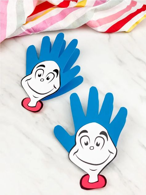 Looking for a fun and easy Dr Seuss craft for preschoolers? This handprint thing 1 printable craft is perfect for kids! It comes with a free printable template and is simple to make at home or at school! Download today. #simpleeverydaymom #kidscrafts #drseusscrafts #preschoolers #preschool #preschoolcrafts #craftsforkids #thing1crafts #handprintcrafts #ece Dr Seuss Craft, Dr. Seuss Crafts, Dr Seuss Art, Dr Seuss Preschool, Preschool Craft Activities, Crafts Summer, Dr Seuss Activities, Dr Seuss Crafts, Craft For Preschoolers