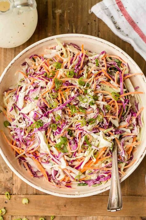 Coleslaw Recipe with Homemade Dressing - NatashasKitchen.com #justapinchrecipes Homemade Slaw Dressing, Traditional Coleslaw Recipe, Homemade Coleslaw Dressing, Mexican Slaw, Classic Coleslaw Recipe, Cucumber Tomato Avocado Salad, Homemade Slaw, Potluck Side Dishes, Coleslaw Dressing