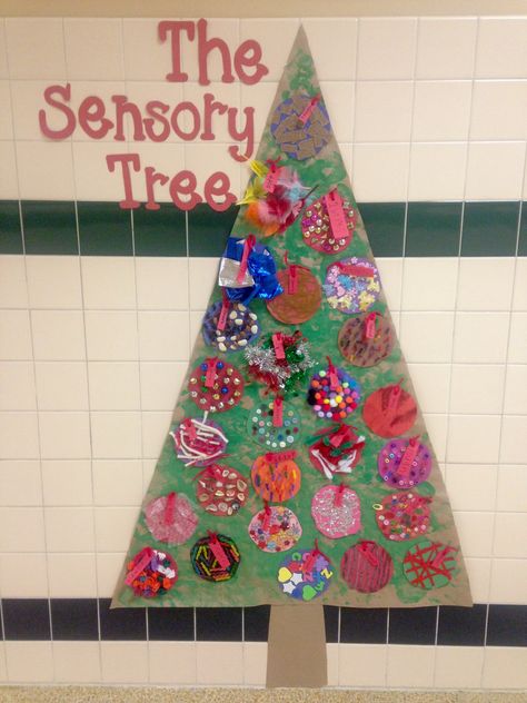 The Sensory Tree.  Occupational Therapy Christmas hallway display.  Each ornament offers a different sensory experience. Occupational Therapy Christmas Crafts, Sensory Christmas Tree, Therapy Christmas Door Decorations, Occupational Therapy Door Decorations, Christmas Occupational Therapy Kids, Speech Therapy Christmas Door, Therapy Gift Ideas, Christmas Occupational Therapy, Occupational Therapy Christmas