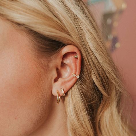 Mini Heart Studs💛 The perfect dainty touch for any outfit or earring lineup #MiniHeartStuds #DaintyEarrings #JewelryLovers #EarringStack #NewFavorites #StyleEssential #GoldAndSilver #HypoallergenicJewelry #PerfectTouch #jewelryaddict #purequartzjewelry #purequartz Mauve Jewelry, Fake Ear Piercings, Second Ear Piercing, Earring Cuff, Faux Piercing, Mini Bow, Diamond Bows, Mini Bows, Pearl Collection