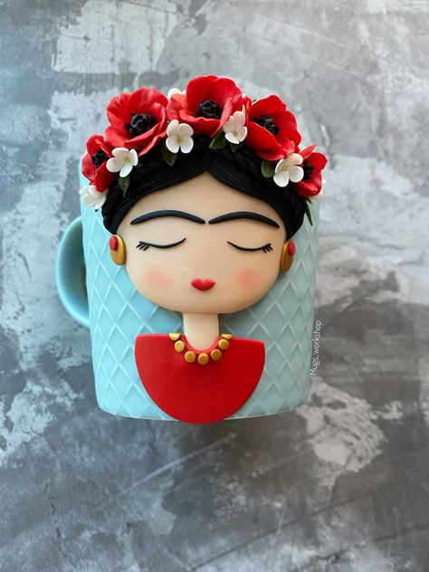 Frida Kahlo coffee cup Polymer Clay Frida Kahlo, Frida Polymer Clay, Dammam Saudi Arabia, Polymer Clay Mug, Clay Embroidery, Beautiful Mugs, Polymer Clay Embroidery, Mermaid Mugs, Handmade Birthday Gifts