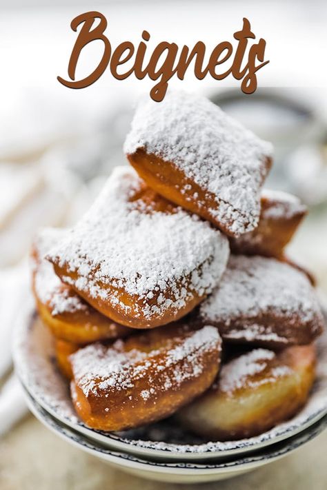 The Best Authentic New Orleans Beignets Recipe - These delicious easy to make light and fluffy fried beignets covered in powdered sugar will make you feel like your right at Café du Monde in New Orleans. #beignets #neworleans #beignetrecipe #donuts #doughnuts New Orleans Beignets Recipe, New Orleans Beignets, French Donuts, Beignet Recipe, Traditional French Recipes, New Orleans Recipes, Haitian Food Recipes, Louisiana Recipes, French Dishes