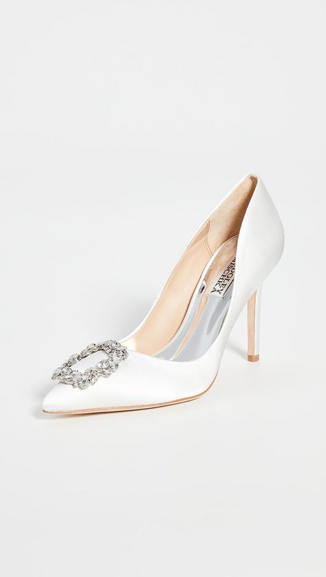 If you want to add a hint of glamour to your wedding day shoes, consider these jeweled pumps from Badgley Mischka. The crystal buckle in the front adds a touch of elegance for a black-tie or formal wedding. Head to the link for more perfect wedding shoes. // Photo: Shopbop Bridal Pumps, Designer Wedding Shoes, Badgley Mischka Shoes, Crystal Brooch, Evening Shoes, Stiletto Pumps, Badgley Mischka, Bridal Shoes, Pump Shoes