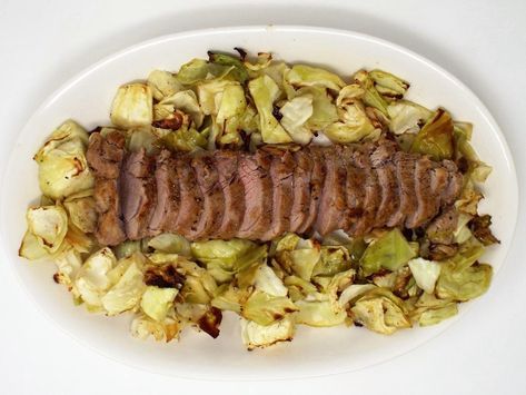 Pork tenderloin seasoned with garlic and ginger then roasted in the oven on a sheet pan with green cabbage. Pork Tenderloin And Cabbage, One Pan Pork Tenderloin, Ginger Pork, Garlic And Ginger, Green Cabbage, One Pan, Pork Tenderloin, Oven Roast, Pork Recipes