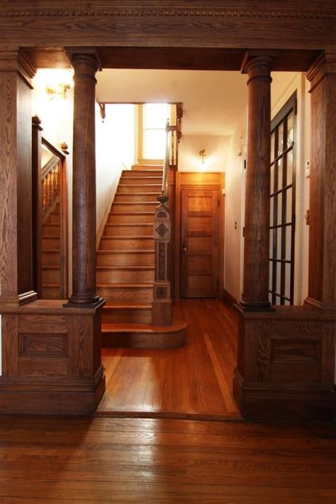 Hallway with columns and staircase with a carved newel post in a Victorian  (1890) 1890 House, Victorian Entryway, Victorian Staircase, Kerala Traditional House, Victorian House Interiors, Staircase Design Modern, Pony Wall, Interior Columns, Interior Staircase