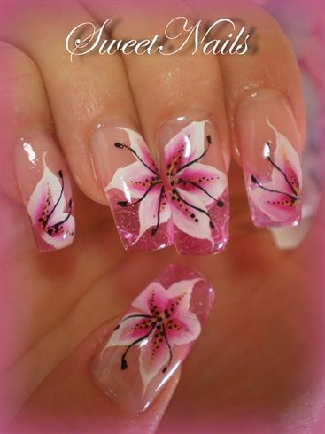 25 Delicate Flower Nail Designs Adding Lovely Blooms To Your Fingertips! Lily Flower Nail Art, Hand Painted Flower Nails, Lilly Nail Art, Lily Flower Nails, Lily Nail Art, Lilly Nails, Tropical Nail Art, Lily Nails, Tropical Nails