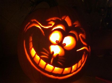 Cheshire cat, so much fun carving this pumpkin! Cheshire Cat Pumpkin, Cool Pumpkin Designs, Cat Pumpkin Stencil, Mischievous Character, Awesome Pumpkin Carvings, Cat Pumpkin Carving, Pumpkin Carve, Halloween Yard Art, Disney Pumpkin Carving