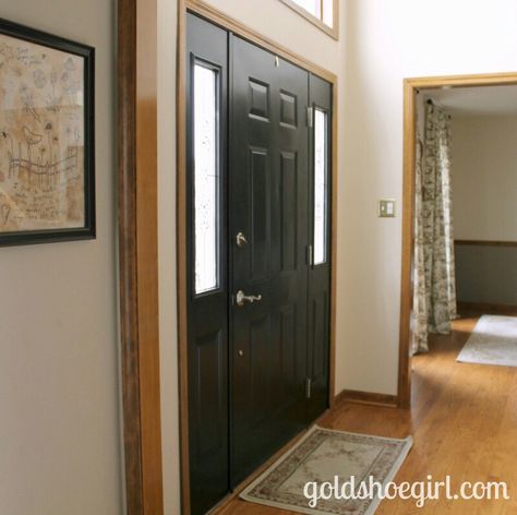 Black door with oak trim Black Door With Wood Trim, Black Doors Wood Trim, Black Doors With Wood Trim, Interior Front Door Black, Interior Front Door Color Entryway, Interior Front Door Color, Black Front Door Interior, Black Interior Front Door, Stained Wood Trim