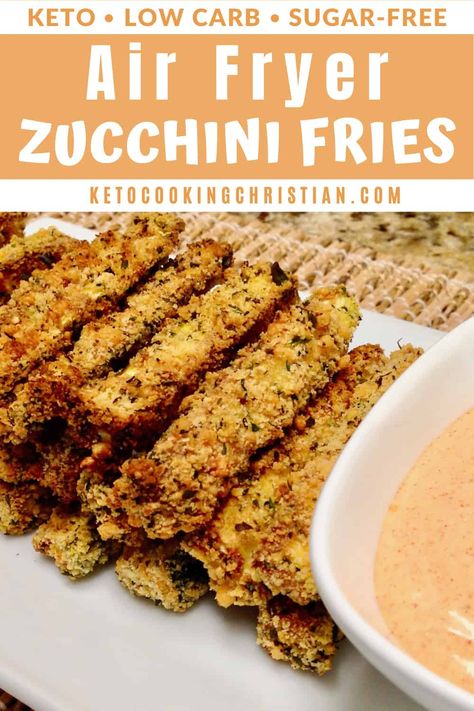 Keto Air Fryer Zucchini Fries Looking for a healthy alternative to french fries? These low carb zucchini fries are baked in the air fryer and have a gluten-free breading. Served with a zesty dipping sauce, these make the perfect Keto snack or appetizer. #ketofries #ketoairfryer #ketobakedzucchinifries Keto Air Fryer Zucchini, Keto Fried Zucchini Recipes, French Fry Alternative Low Carb, Air Fryer Zucchini Chips Keto, Keto Zucchini Fries Air Fryer Recipes, Low Carb Baked Zucchini Fries, Low Carb Zucchini Fries, Low Carb Vegetables, Low Carb Zucchini