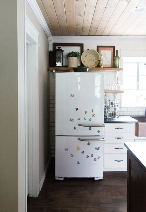 What Your Fridge Decor Reveals About Who You Really Are — Happy at Home | The Kitchn Open Shelves Above Refrigerator, Open Shelf Over Fridge, Open Shelving Over Fridge, Shelving Above Fridge Open, Above Refrigerator Storage Open Shelves, Shelves Above Refrigerator Ideas, Open Shelves Over Refrigerator, Awkward Space Above Fridge, Above Fridge Ideas Open Shelves