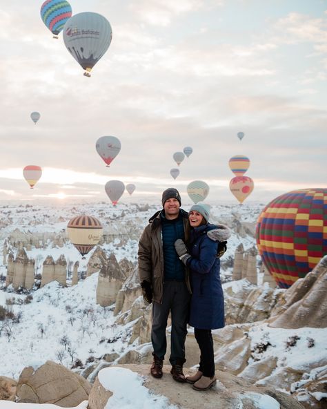 Have you considered Cappadocia in the winter? If not, it’s time to change that. We just went for a few days after snow had covered the area and it was even more stunning than when we visited in October. It was also noticeably less busy, hot air balloon prices were cheaper, hotels were cheaper, we didn’t have any problems getting our group of 13 into any restaurants. I have been converted to believe winter is the best time to visit Cappadocia. During this visit we: - Visited Göreme Open A... Cappadocia Winter, Europe With Kids, Traveling In Europe, Balloon Prices, Travel In Europe, Tips For Traveling, New Place, Hot Air Balloon, In The Winter