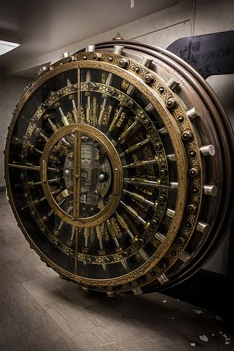 How cool would it be to have a bank vault door in your house????Shannon O'Toole's "Highrise - Bank" Vault | Steampunk | Dieselpunk Bank Vault, Safe Door, Safe Vault, Vault Doors, Industrial Art, Mechanical Design, Dieselpunk, Vaulting, Abandoned Places