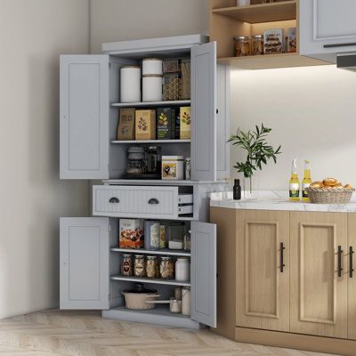 Ample Space: The freestanding pantry has large space with a deep, easy-gliding drawer and two large cabinets with magnetic closure doors, making it suitable for storing various household items such as silverware, knick-knacks, towels, cookware, etc. | Red Barrel Studio 72" Kitchen Pantry Storage Cabinet, Manufactured Wood | C111163379_512646352 | Wayfair Canada Pantry Unit, Freestanding Pantry, Large Cabinets, Freestanding Storage Cabinet, Kitchen Unit, Food Pantry Organizing, Freestanding Bathroom Cabinet, White Bathroom Cabinets, Pantry Storage Cabinet