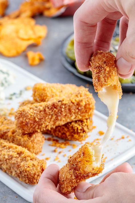 Nashville Hot Mozzarella Sticks with Hatch Chile Blue Cheese Dip recipe on the blog!  Homemade mozzarella sticks breaded with Nashville Style Kettle Cooked Hot Chicken Potato Chips. Roasted hatch chile blue cheese dip.  #sponsored with @Kroger Co. Homemade Cheese Sticks, Blue Cheese Dip Recipe, Homemade Mozzarella Sticks, Homemade Mozzarella, Cheese Dip Recipe, Bar Snacks, Mozzarella Cheese Sticks, Blue Cheese Dip, Savoury Snacks