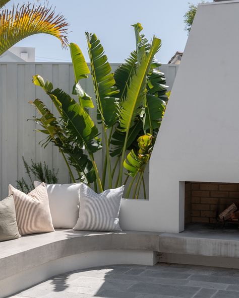 This intimate backyard in Sorrento perfectly complements a coastal home, designed with outdoor entertaining in mind. A stunning outdoor fireplace takes centre stage, framed by elegant built-in seating and dappled afternoon shade 🍃 We love how every angle of this outdoor space captures the eye, with coastal-inspired plantings that have settled beautifully and promise even more charm as the garden matures over time. ✨🌿💚 Landscape Design @outsideinbydenise Landscaping @jnroutdoorliving Ca... Built In Seating, Centre Stage, Outdoor Fireplace, Coastal Home, Sorrento, Coastal Homes, Outdoor Entertaining, Center Stage, Landscape Design