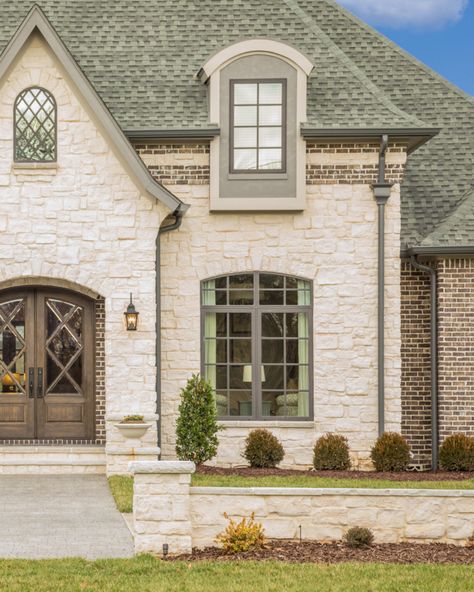 Ready to rock your home renovation? 🪨 Stone veneer is a great way to give your exterior a bold facelift. With a home as warm and inviting as this, you'll be the talk of the town! https://bit.ly/2PmE0CW Old St Louis Brick Exterior, Stone And Brick Exterior Houses, Houses With Stone Exterior, All Brick House Exterior, Brick Homes Exterior, Brick And Stone House Exterior, Stone Front House, Stone House Exterior, Stone Veneer Exterior