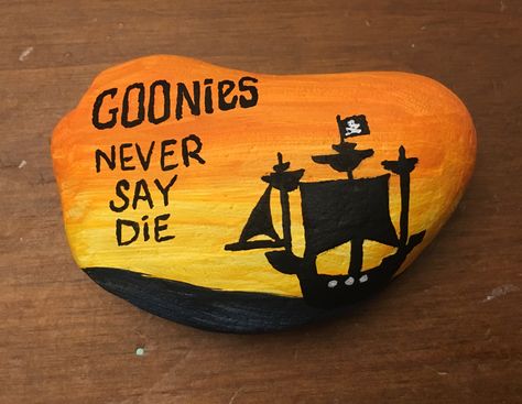 Goonies painted rock Movie Painted Rocks, Disney Rock Painting Ideas, Los Goonies, Les Goonies, Hunting Crafts, Painted Garden Rocks, Produce Displays, Classic Disney Movies, Diy Rock Art