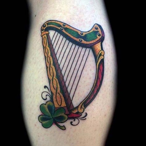 Old School Harp With Clover Irish Guys Arm Tattoo Irish Harp Tattoo, Irish Flower Tattoo, Harp Tattoo, Tato 3d, A Small Tattoo, Ireland Tattoo, Shamrock Tattoos, Irish Tattoos, Clover Tattoos