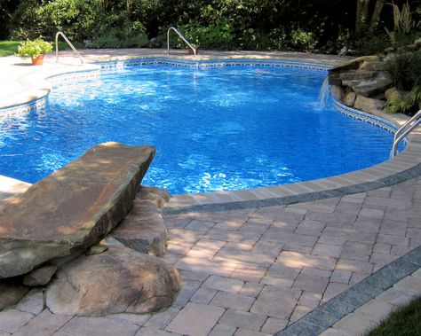 Pool with dive rock, water fall and detailed paving design. Around The Pool Landscaping, Pool Makeover, Freeform Pools, Pool Renovation, Pool Remodel, Pool Landscape Design, Diving Board, Backyard Pool Landscaping, Dream Pools