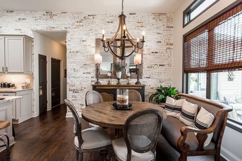 Imperfections of the whitewashed brick wall accentuate the beauty of this dining room - Decoist Brick Dining Room Wall, Whitewashed Brick Wall, Brick Wall Dining Room, Brick Dining Room, Whitewashed Brick, Faux Brick Wall Panels, Natural Dining Room, Dining Room Accent Wall, Dining Room French