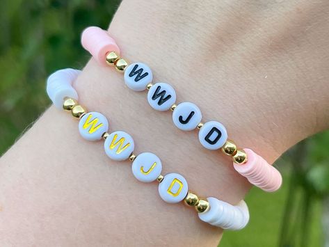 The perfect daily reminder 🤍 #handmadejewelry #handmadebracelet #beadbracelet #beadedbracelet #heishibeads #heishibracelets #WWJDbracelet #christianbracelet #christianjewelry What Would Jesus Do Bracelet, Wwjd Bracelet, Gold Bead Bracelet, What Would Jesus Do, Christian Bracelets, Gold Bead Bracelets, Christian Jewelry, Bracelets Handmade Beaded, Heishi Beads