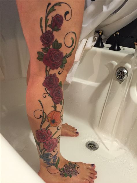 Finished leg tattoo Full Body Rose Tattoo, Roses Tattoos, 2024 Manifesting, Memorial Tattoo Designs, Cute Thigh Tattoos, Manifesting Board, Colorful Tattoos, Hip Thigh Tattoos, Full Leg Tattoos